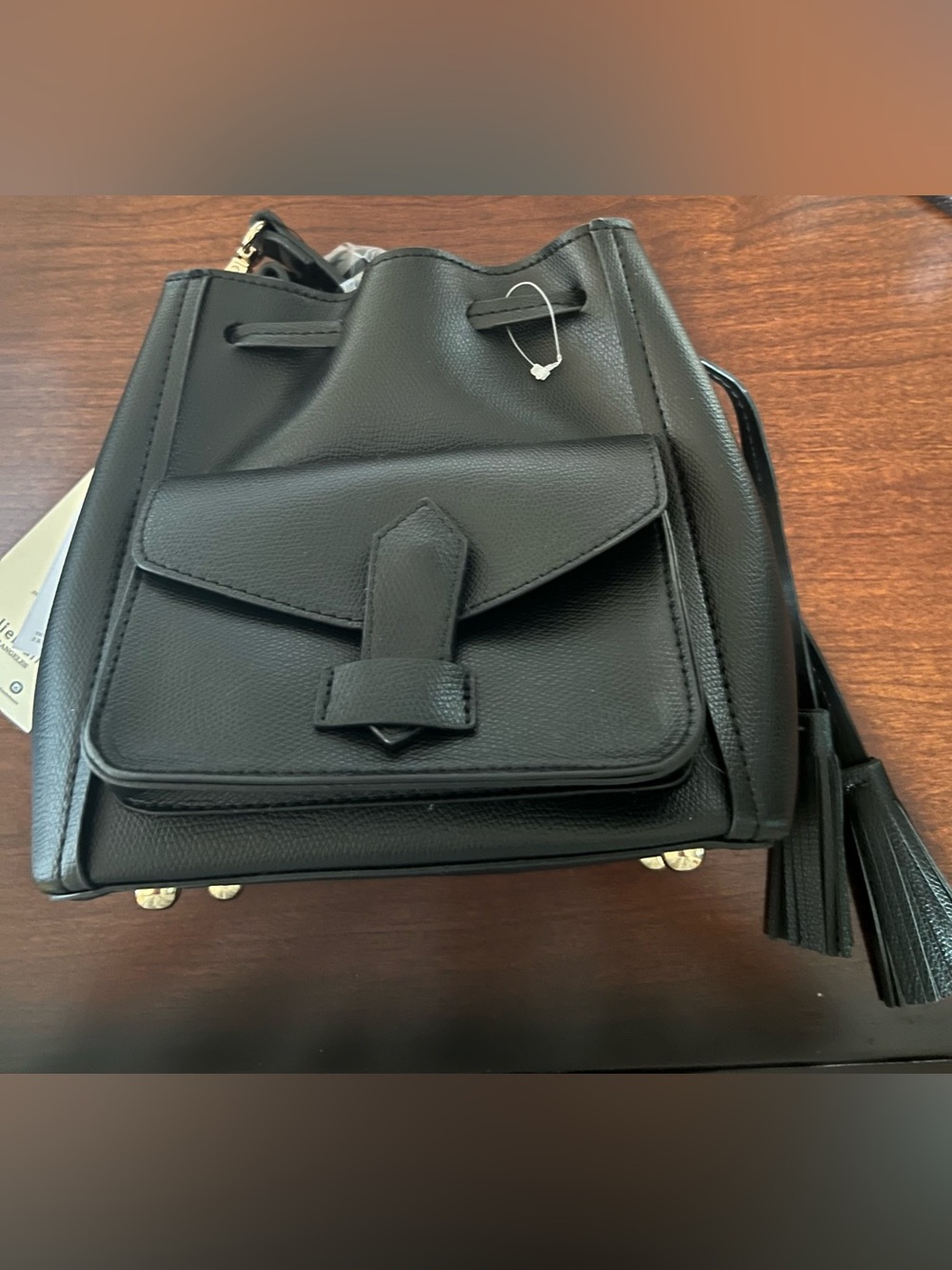 Melie Biianco Black Faux Leather Drawstring Crossbody with Front Pocket